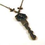 Bronzed angels key necklace..