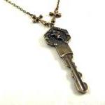 Bronzed angels key necklace..
