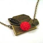 Bronze envelope necklace je..