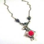 Silver tone roses, bow and ..