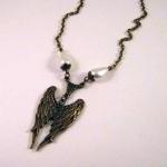 Bronzed angel wings necklac..