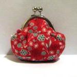 Flower on red frame pouch -..