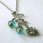 Antiqued silver owl necklac..