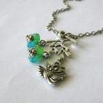 Antiqued silver owl necklac..