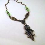 Antiqued bronze sword neckl..