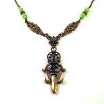 Antiqued bronze sword neckl..