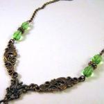 Antiqued bronze sword neckl..