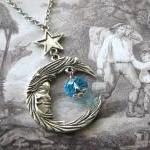 Antiqued silver moon and st..