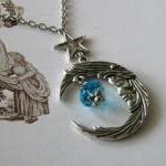 Antiqued silver moon and st..