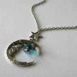 Antiqued silver moon and st..