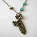 Bronzed dragonfly wing neck..