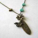 Bronzed dragonfly wing neck..