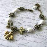 Antiqued gold bee bracelet ..