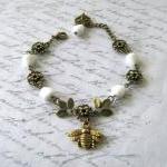 Antiqued gold bee bracelet ..