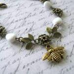Antiqued gold bee bracelet ..