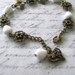 Antiqued gold bee bracelet ..