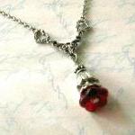 Red flower bud necklace jew..