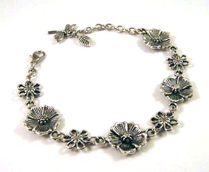 Silver flower bracelet jewelry with dragonfly charm