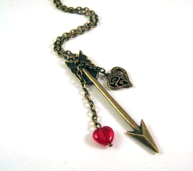 Bronzed arrow necklace jewelry with heart charm and red heart glass bead