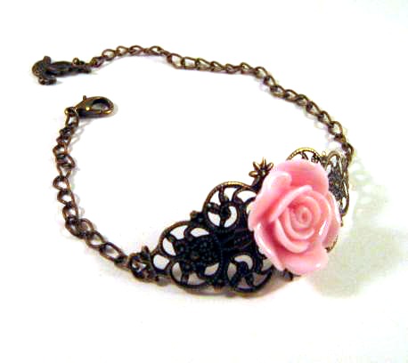 Bronzed filigree with light pink resin flower and bird charm