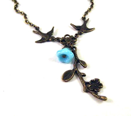 Bronzed flower branch necklace jewelry with blue flower and swallow birds